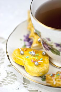 English afternoon tea with sweet and decored cookies