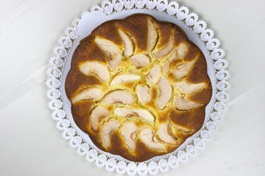 Homemade italian baked apple pie over a white table