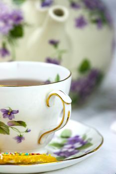 English afternoon tea with sweet and decored cookies