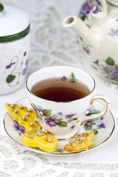 English afternoon tea with sweet and decored cookies