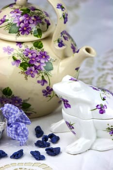 English afternoon tea with sweet and candied violets