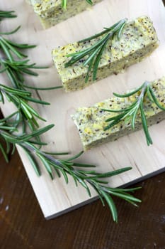 Baked polenta "taragna" (corn and buckwheat flours) with italian cheese (taleggio, gorgonzola, parmigiano reggiano) and rosemary