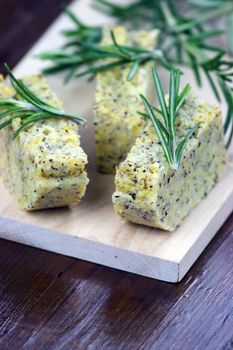 Baked polenta "taragna" (corn and buckwheat flours) with italian cheese (taleggio, gorgonzola, parmigiano reggiano) and rosemary