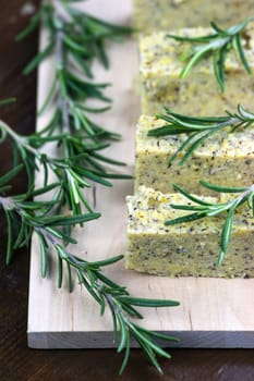 Baked polenta "taragna" (corn and buckwheat flours) with italian cheese (taleggio, gorgonzola, parmigiano reggiano) and rosemary