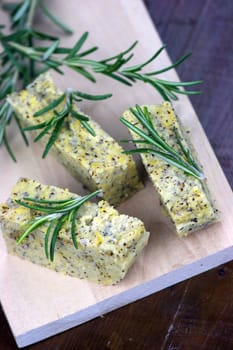 Baked polenta "taragna" (corn and buckwheat flours) with italian cheese (taleggio, gorgonzola, parmigiano reggiano) and rosemary