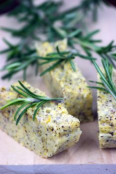 Baked polenta "taragna" (corn and buckwheat flours) with italian cheese (taleggio, gorgonzola, parmigiano reggiano) and rosemary