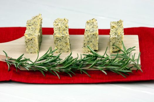 Baked polenta "taragna" (corn and buckwheat flours) with italian cheese (taleggio, gorgonzola, parmigiano reggiano) and rosemary