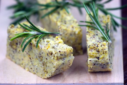 Baked polenta "taragna" (corn and buckwheat flours) with italian cheese (taleggio, gorgonzola, parmigiano reggiano) and rosemary