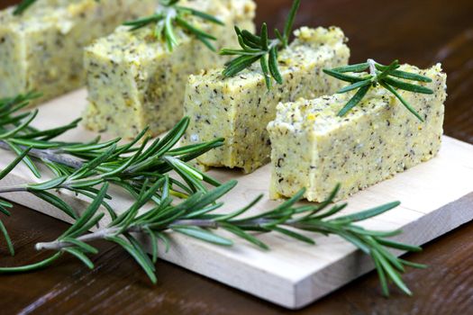 Baked polenta "taragna" (corn and buckwheat flours) with italian cheese (taleggio, gorgonzola, parmigiano reggiano) and rosemary