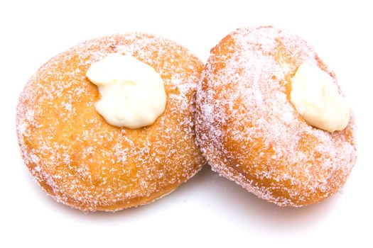 Donuts with sugar on white background