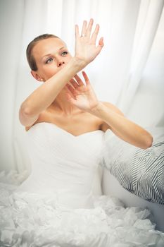 Beautiful bride getting ready for her wedding day
