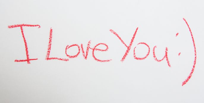 Handwritten simple words. I love You. On white paper. Creative card