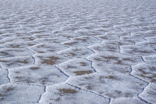 Shapes on the surface of salt planes Salina Grandes in Argentina