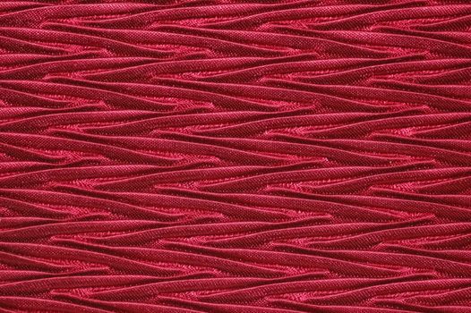 deep red textured fabric close-up