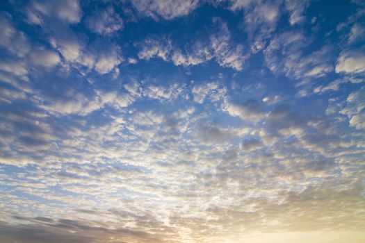 Clouds on evening sky colors.