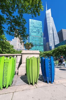 Skyscrapers and nature in Bryant Park, Manhattan, New York.