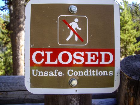 Sign warning of unsafe conditions on nature trails