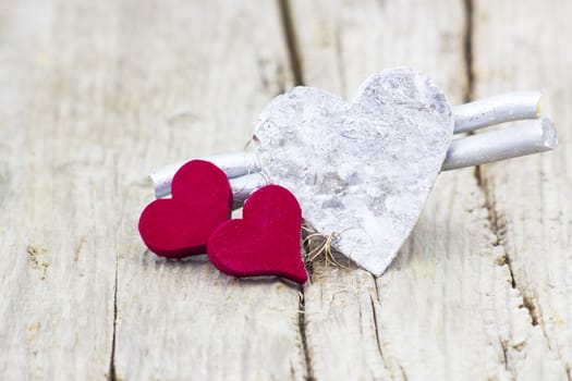 hearts on wooden background