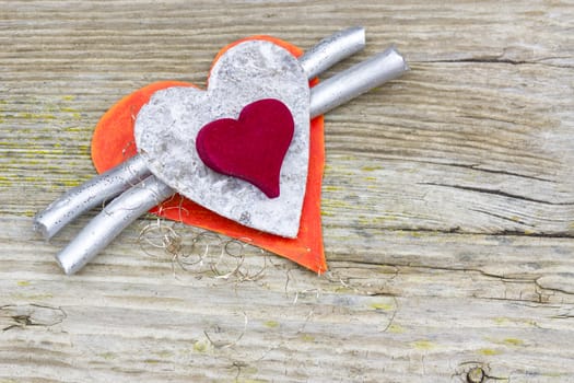 hearts on wooden background