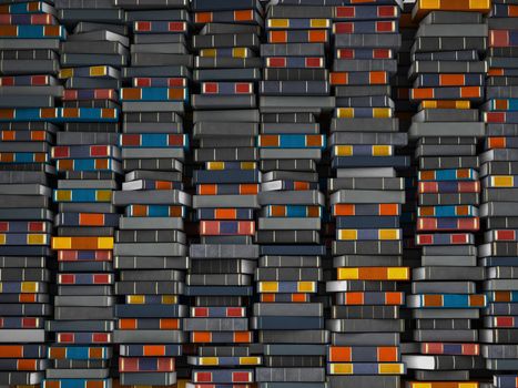 Many books, stacked in wall