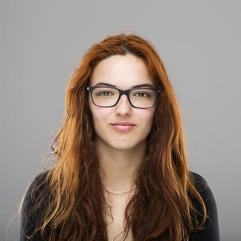 Portrait of beautiful hypster woman with red hair 