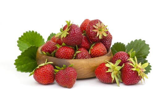 fresh strawberries in a bowl on white background