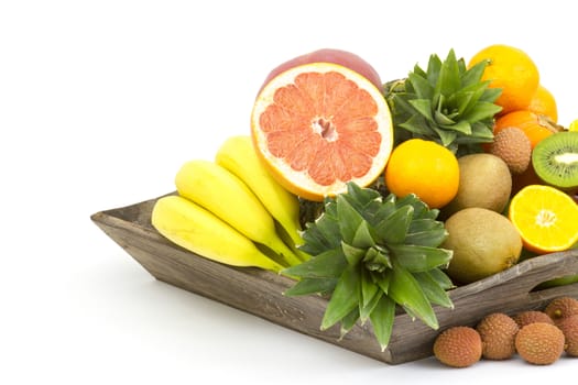 fresh fruit on a wooden tray