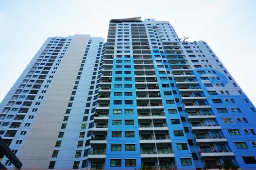 High-rise building with cement painted blue color in the capital.                               