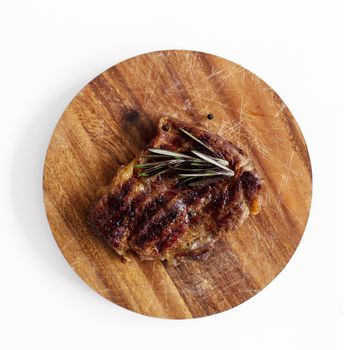 Grilled steak on a white background