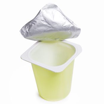 Empty yoghurt pot on a white background