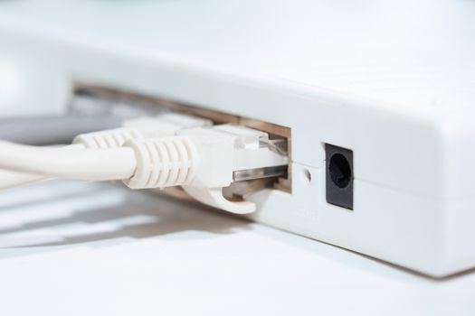 Network modem with cables. Close-up horizontal photo