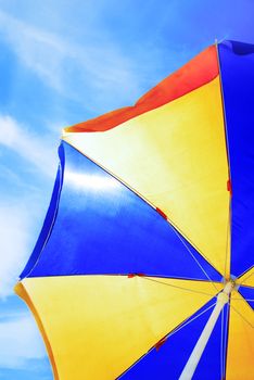 Close-up photo of the beach umbrella on blue sky