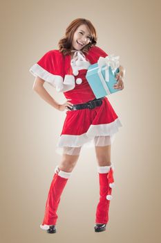 Smile happy Asian Christmas girl hold gift box, isolated full length portrait.