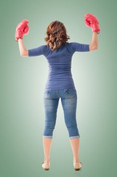 Fighting girl concept, rear view full length portrait of Asian isolated.