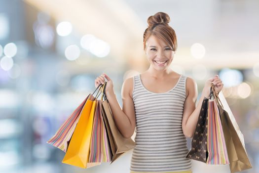 Shopping girl of Asian, closeup portrait isolated on white with clipping path.