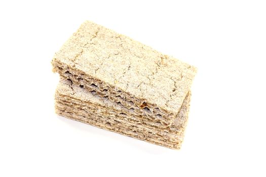 small stack of fresh crispbread on a light background
