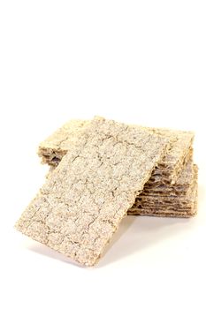 small stack of crispy crispbread on a light background