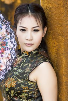 Chinese woman back dress traditional cheongsam ,close up portrait