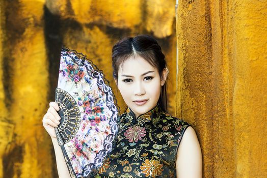 Chinese woman back dress traditional cheongsam ,close up portrait