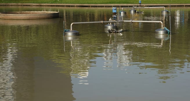 Electric aerator in pond use to make the good environment                              