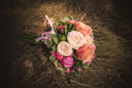 wedding bouquet from different rose color roses