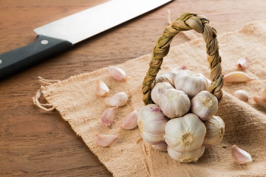 Organic garlic on wood table