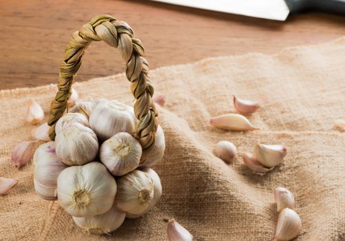 Organic garlic on wood table