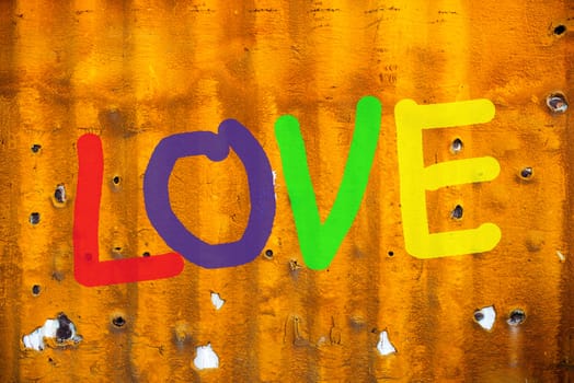 Word LOVE (uppercase) on old Containers background