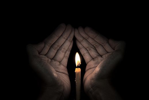 Candle light in hand, Hope concept