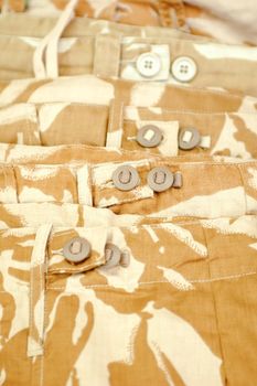 beige colored military desert camouflage clothing