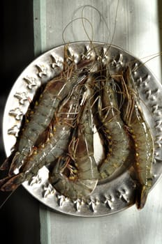 Plate full of raw shrimps in Bangladesh