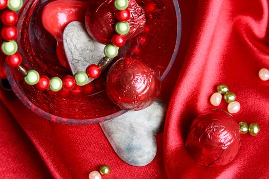 Valetine day hearts in a bowl with jewelery