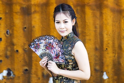 Chinese woman back dress traditional cheongsam ,close up portrait