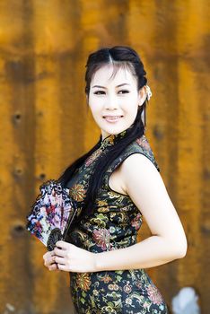 Chinese woman back dress traditional cheongsam ,close up portrait